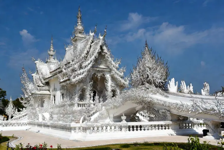 The famous White Temple Wat Rong Khun in Chiang Rai sparkling in the sun