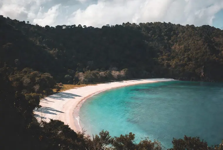Beautiful crescent bay with turquoise water on the south of Koh Lanta