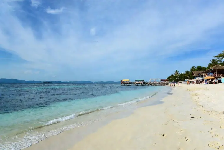 Pattaya Beach on Koh Lipe with clear turquoise water and beach restaurants