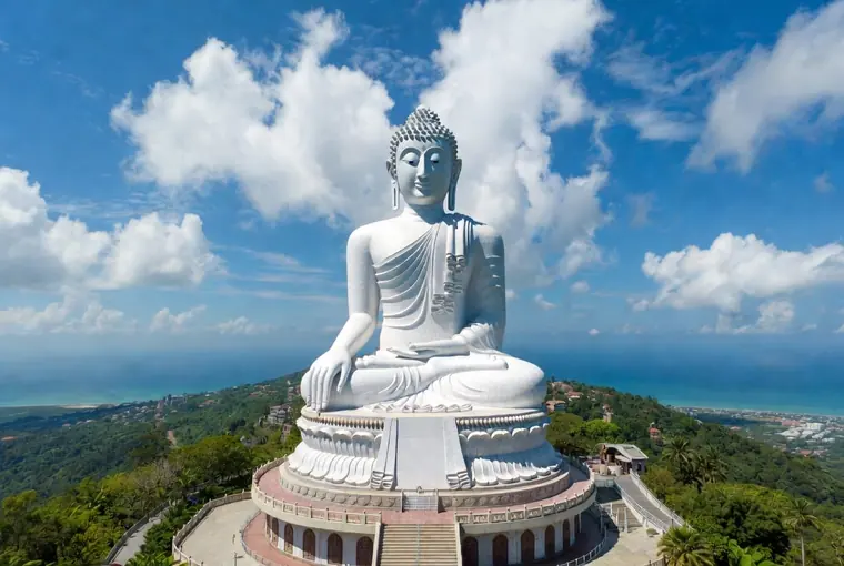 Large white Big Buddha statue overlooking Phuket and the Andaman Sea