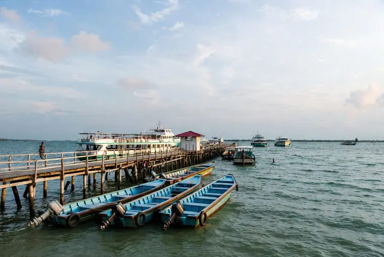 Ferry pier and boats at Don Sak near Surat Thani