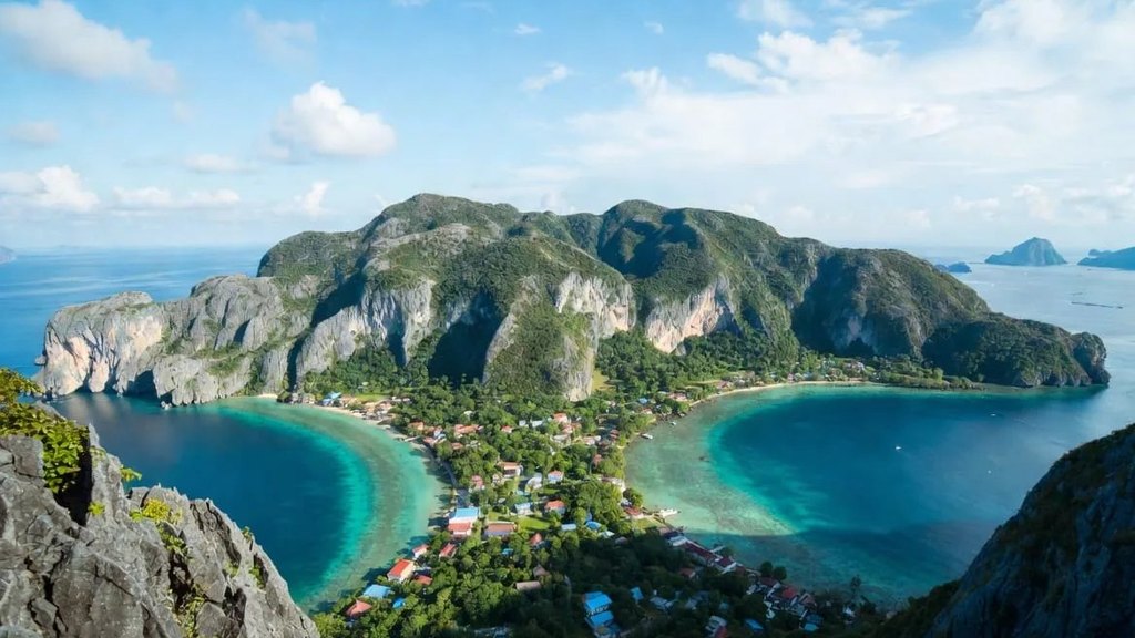 Panoramic viewpoint over the twin turquoise bays of Koh Phi Phi Don, one of the best places to visit in Thailand once the Andaman season reopens