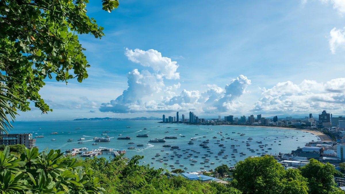 Panoramic view over Pattaya Bay and the 3km curve of Beach Road from the Pratumnak viewpoint, the setting for the fireworks festival in this Pattaya travel guide