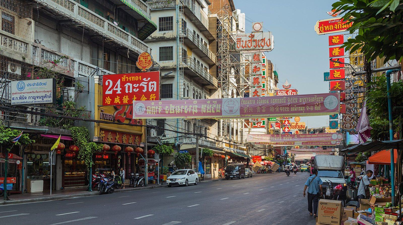 Yaowarat Road in Bangkok's Chinatown lined with gold shops, red lanterns and Chinese-Thai signboards, the main street of the Yaowarat Vegetarian Festival and a centre of Bangkok tourism
