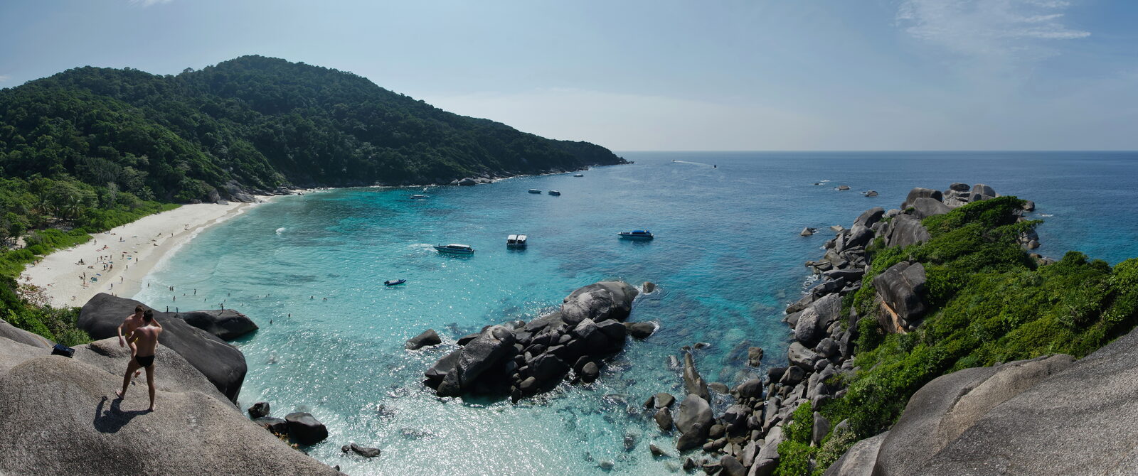 Panorama of Ao Kuerk bay in the Similan Islands with granite boulders, pale sand and turquoise water, one of the Thailand islands reopening for the 2026-27 Andaman season