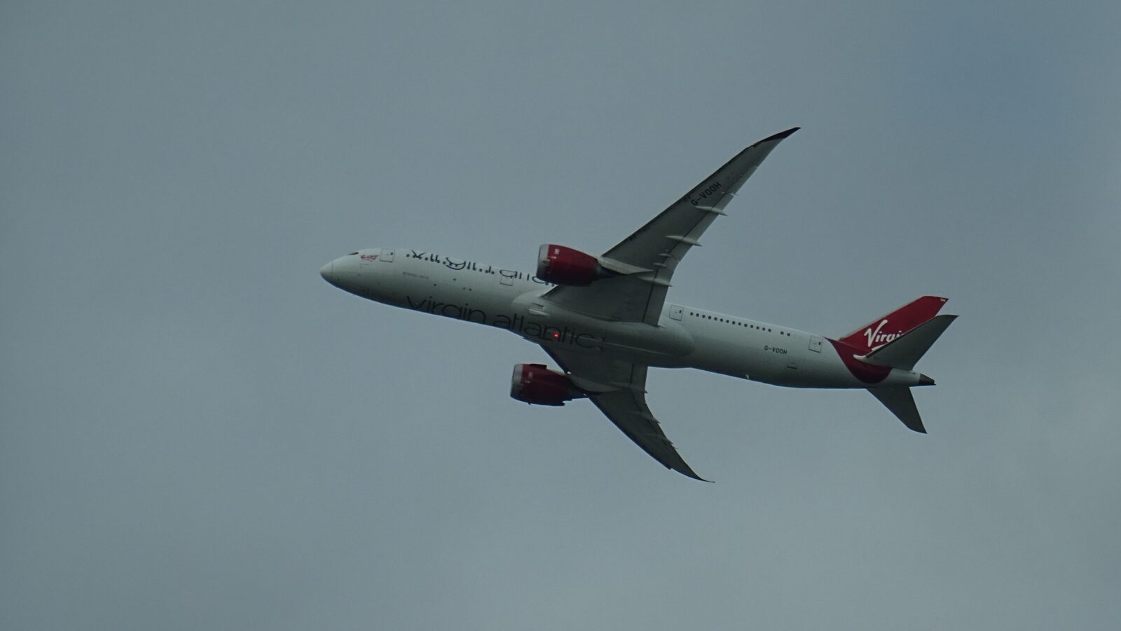 A Virgin Atlantic Boeing 787-9 Dreamliner in red livery climbing away from London Heathrow, the aircraft type now flying the new nonstop route to Phuket in this Thailand tourism update