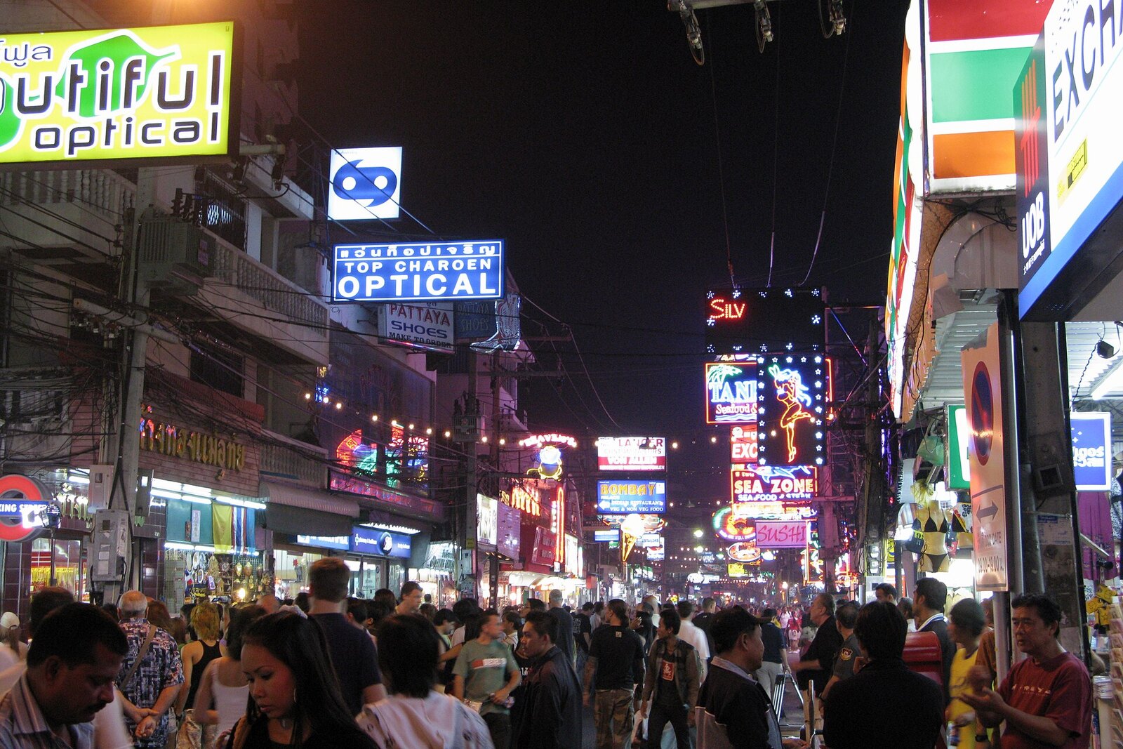 Walking Street in Pattaya at night, neon signs blazing above a crowded pedestrian street, the venue for the Halloween Festival in this Pattaya travel guide