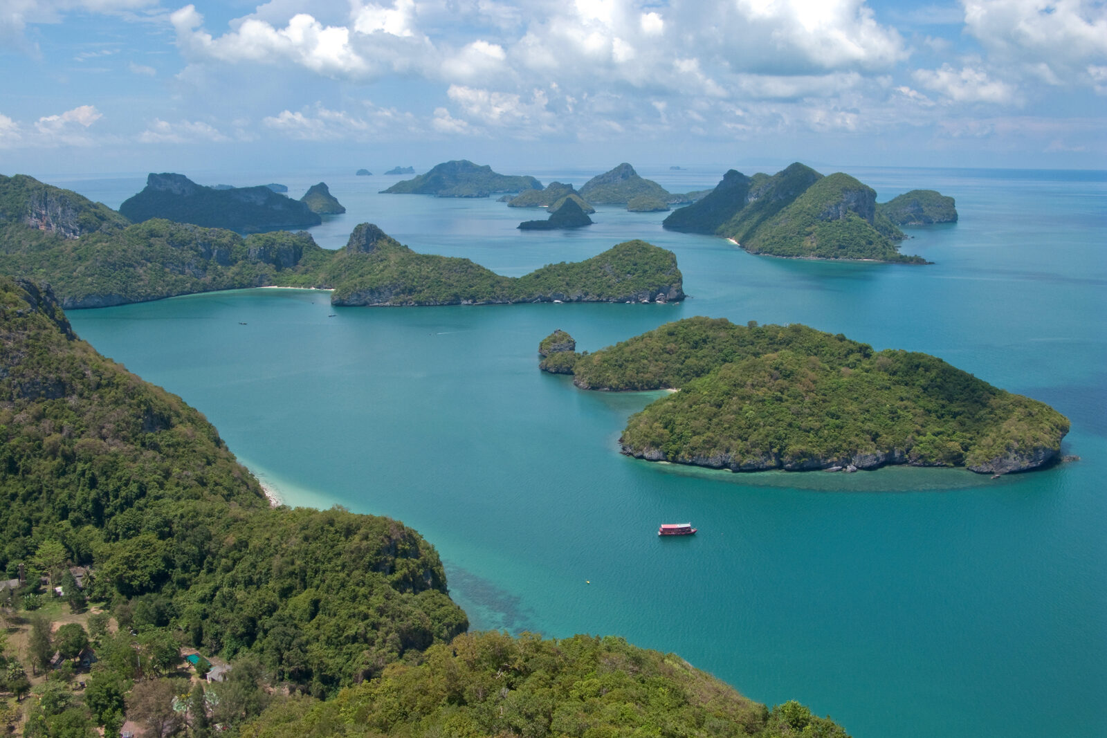 Aerial view over the limestone islands and turquoise water of Mu Ko Ang Thong National Marine Park near Koh Samui, the Thailand islands destination closing on 1 November in this Thailand tourism update