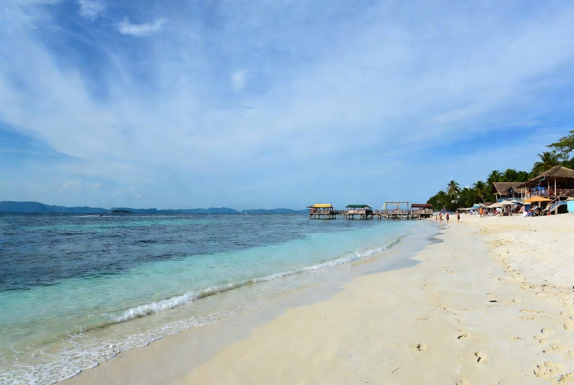 Pattaya Beach on Koh Lipe with clear turquoise water and beach restaurants