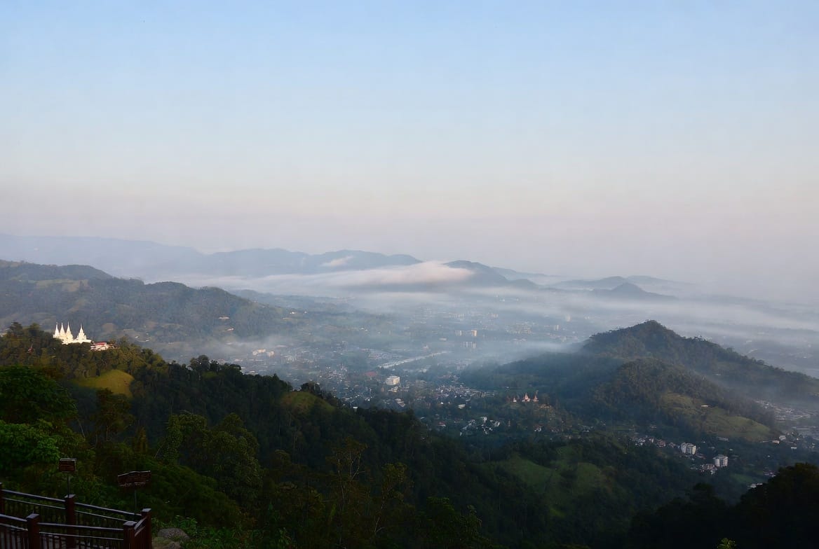 Misty morning view over Chiang Mai valley and surrounding mountains