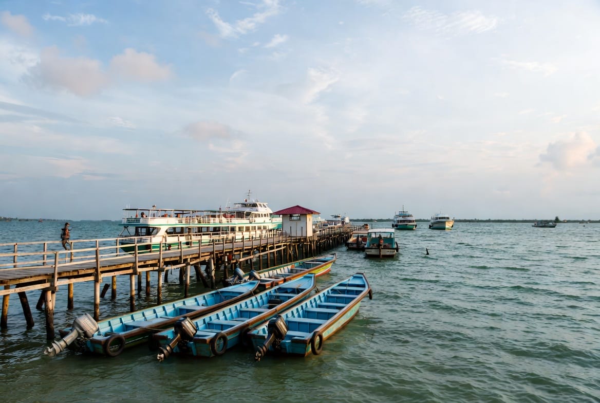 Ferry pier and boats at Don Sak near Surat Thani