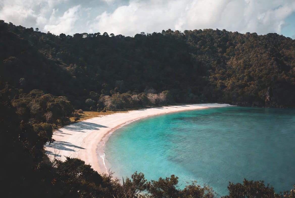Beautiful crescent bay with turquoise water on the south of Koh Lanta