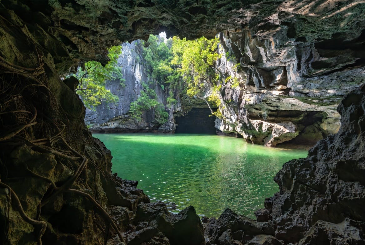 Emerald Cave Tham Morakot on Koh Muk with green lagoon and limestone cliffs