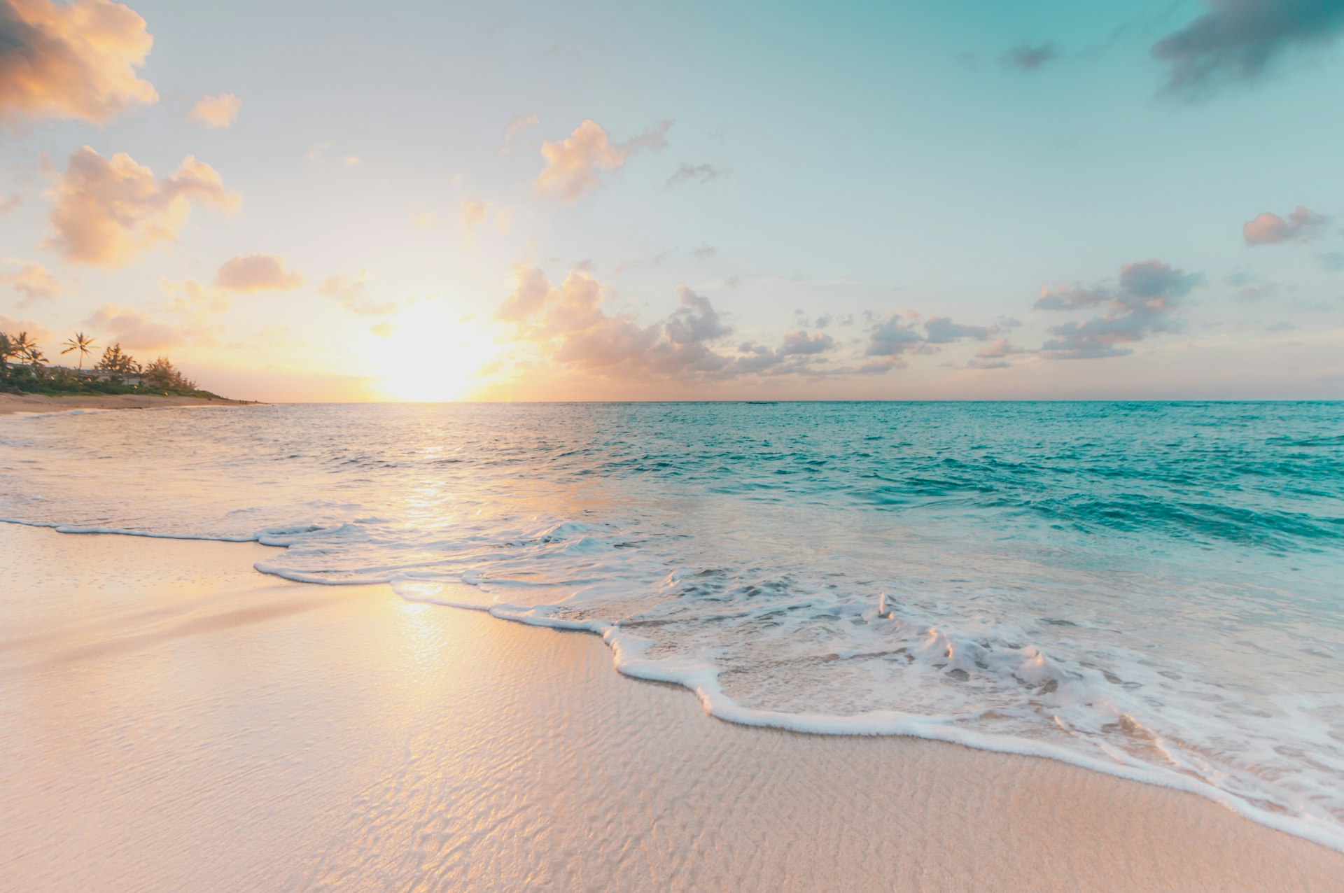 Quiet white sand beach with palm trees on Koh Samui