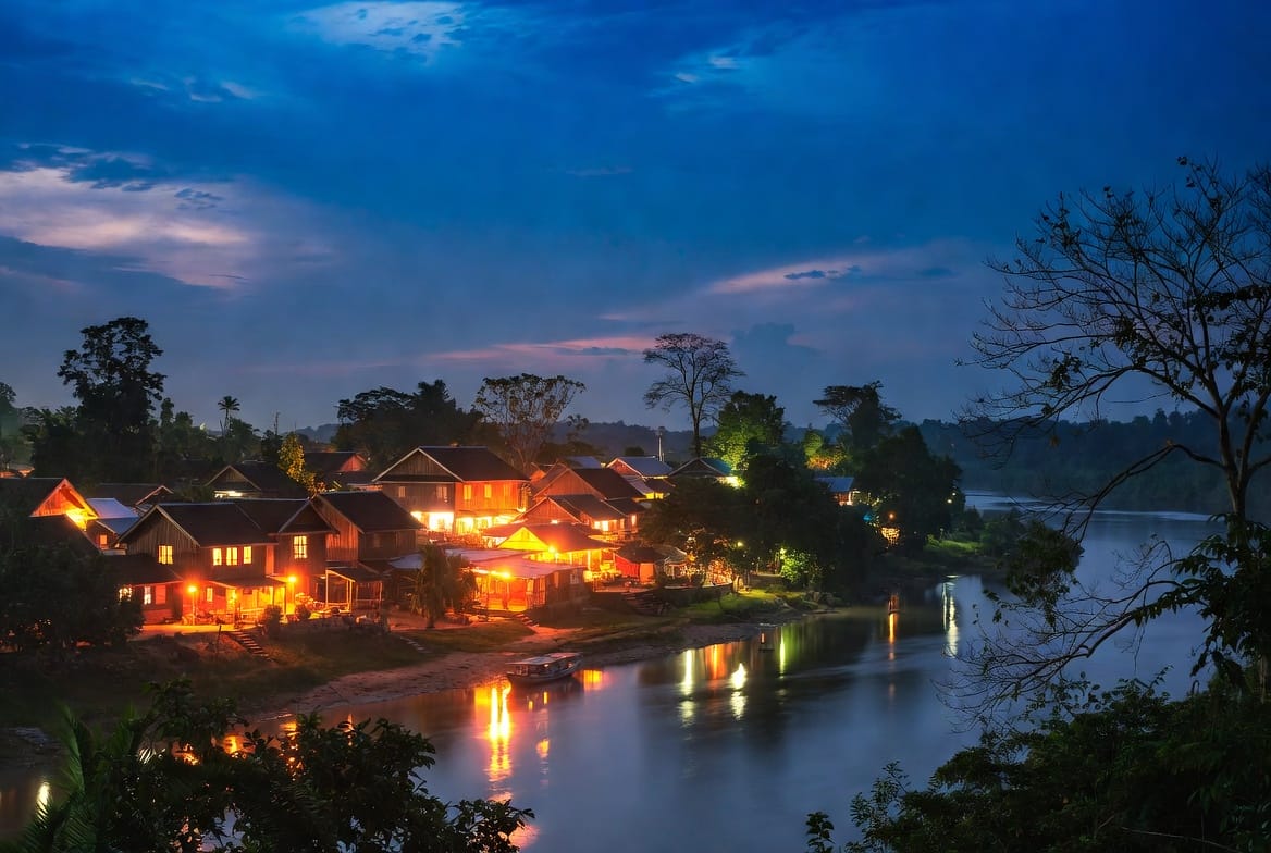 Wooden houses along the Mekong River in Chiang Khan Loei at dusk