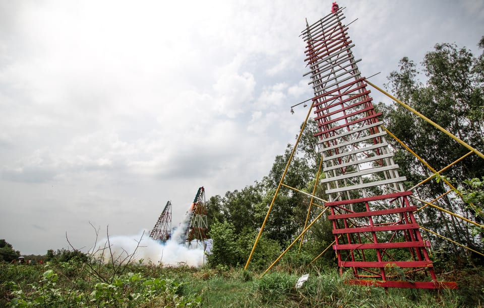 Rocket-launch platforms and smoke at the Yasothon Rocket Festival