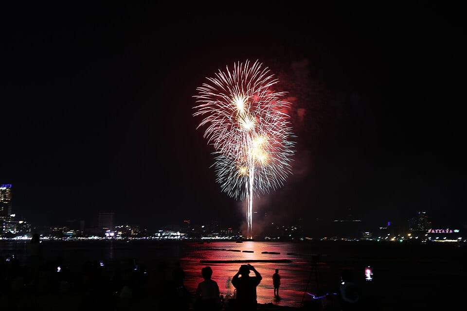 28 November 2020 fireworks over Pattaya Bay with shoreline and spectators