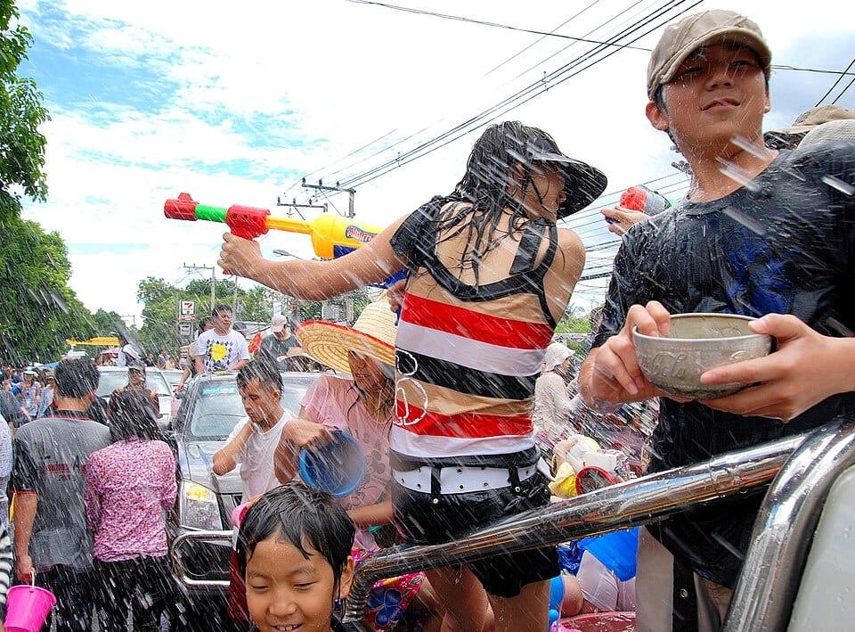 Water guns, soaking crowd and pickup beside Chiang Mai moat, April 2009